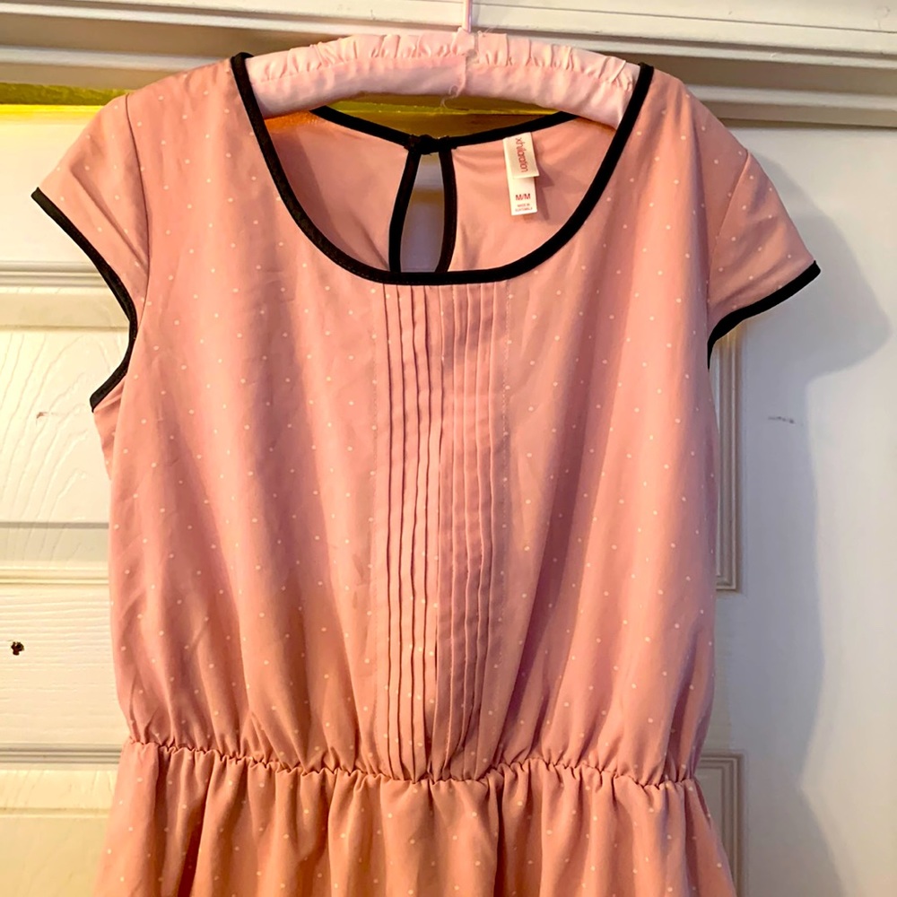 Light pink dress, has white polka dots. Size M. Brand xhilaration